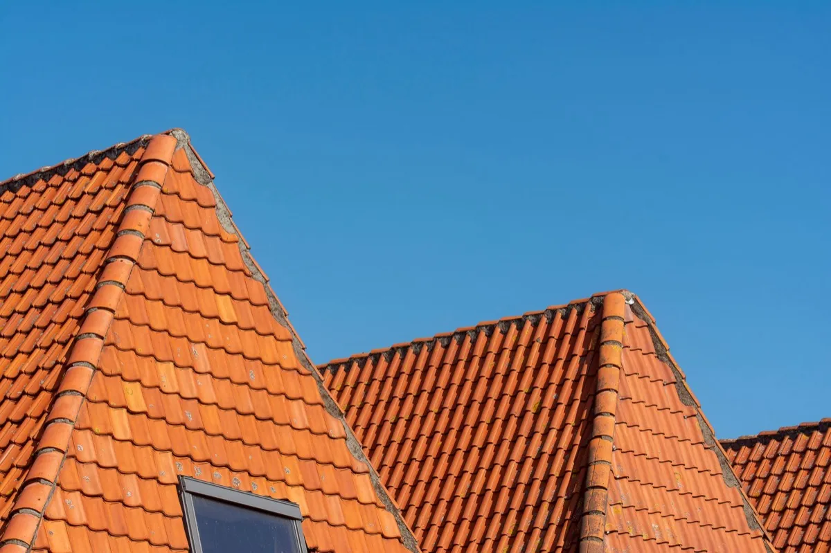 Clay barrel tile rooflines on homes in Orland Park, IL